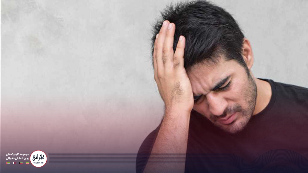 مردی مبتلا به میگرن